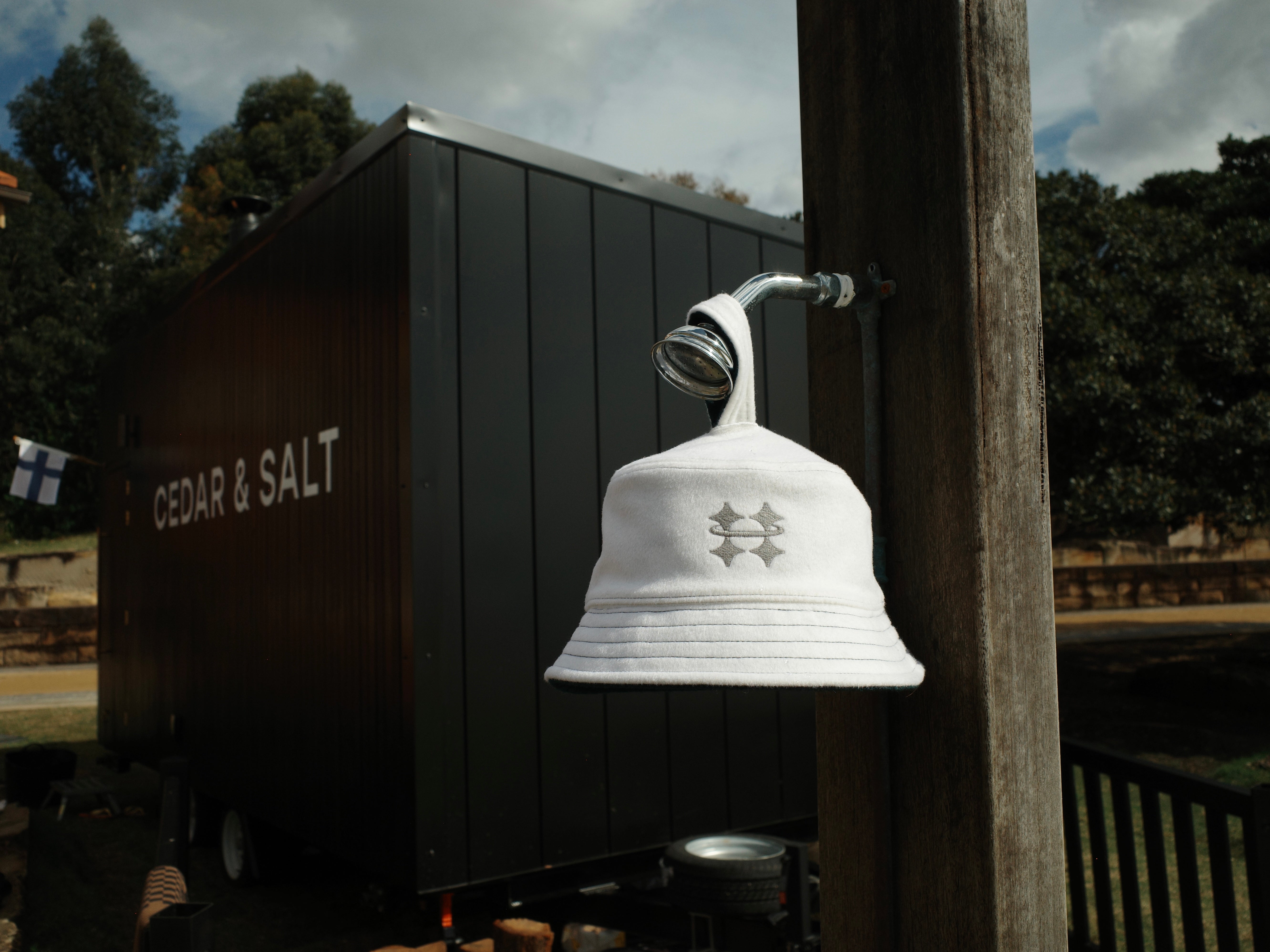 Sauna hat hanging from shower head